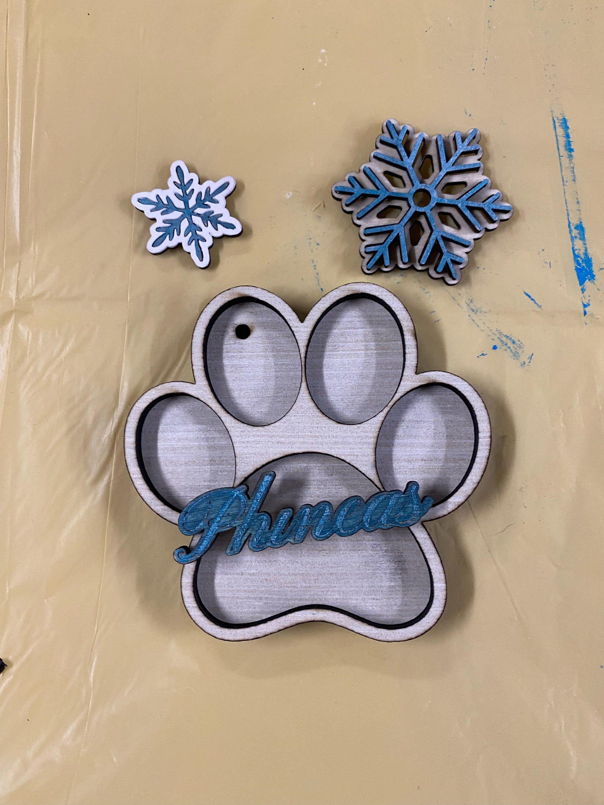 Wood dog paw ornament